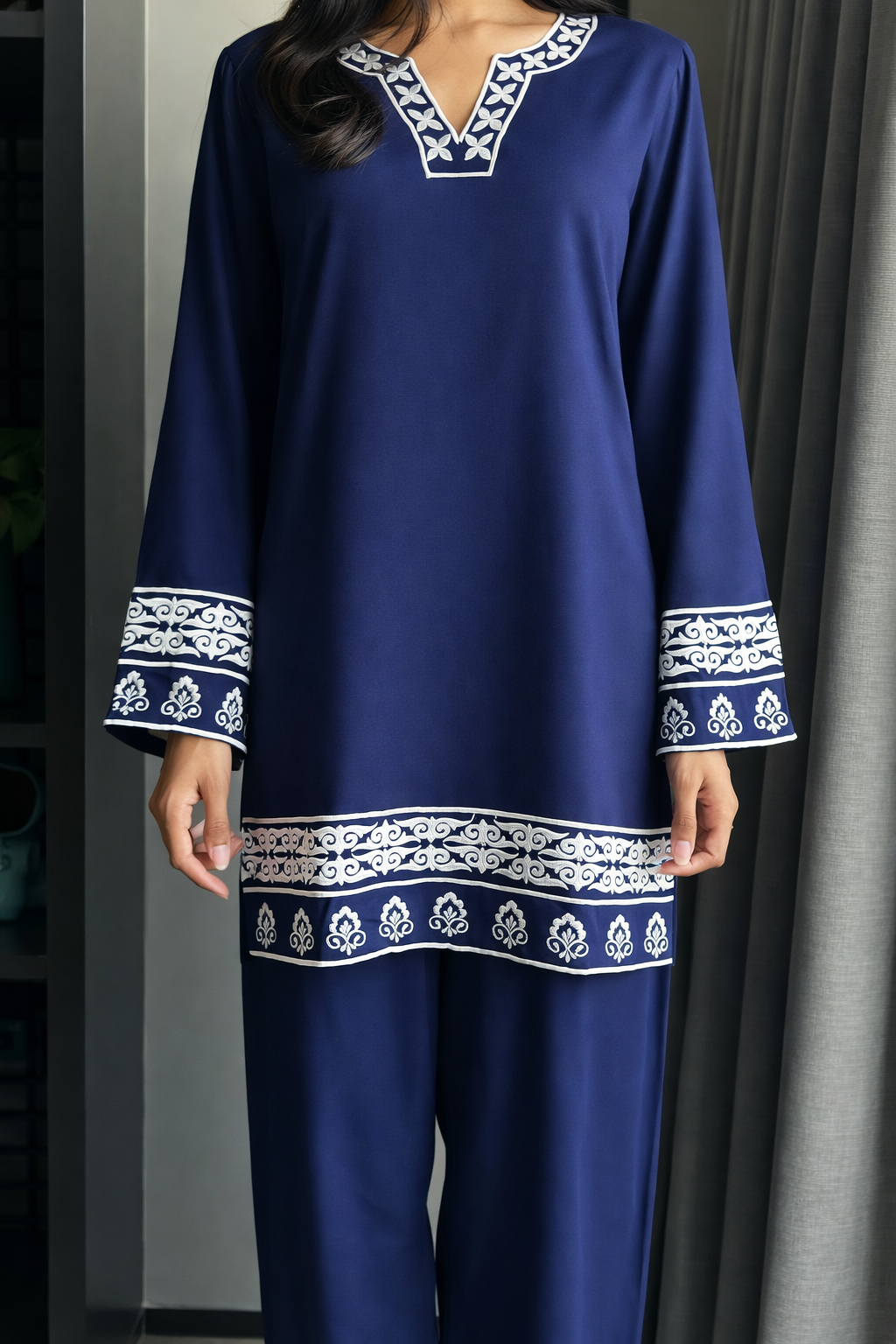 Woman wearing a blue embroidered co-ord set